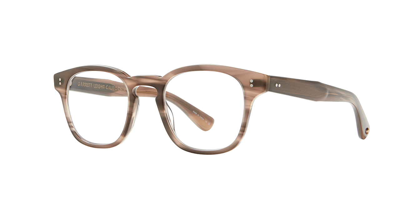 Our cult-favorite Ace Sun transformed into an optical. Ace II reflects the standard way in which we design and create premium eyewear. We’re not reinventing the wheel here – just putting some rims on ‘em. In Sequoia Tortoise, an ashy light brown tortoise shell like pattern. This image shows the sideview of the frame.
