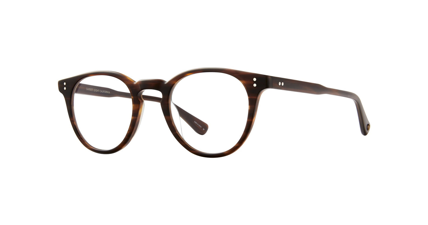 A bold silhouette and minimal hardware make the Clement Matte Brandy Tortoise striking in its simplicity. Thoughtfully pared back with a new temple design, these eyeglasses evoke the spirit of Andy Warhol. Handcrafted in California. Now Available in Toronto, Canada.