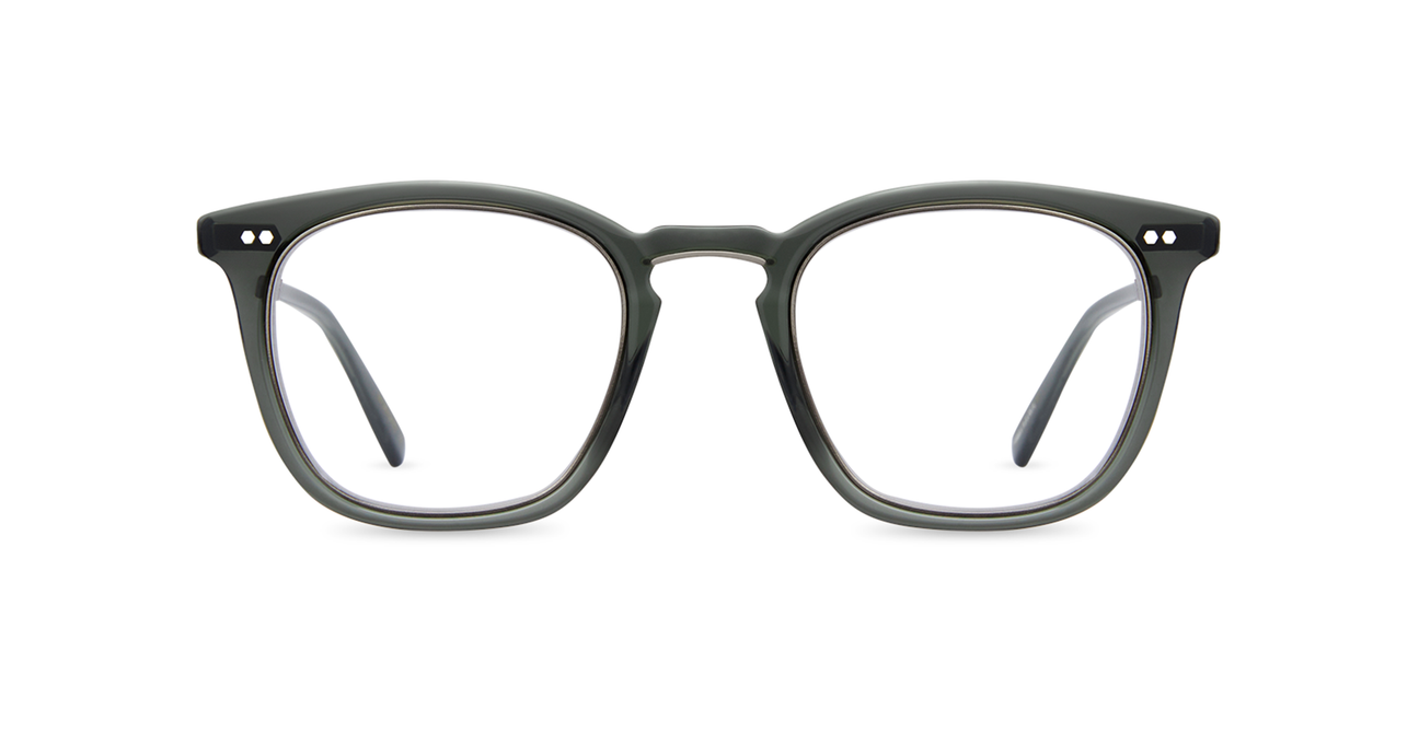 Getty II is a balanced square eyeglass silhouette inspired by iconic Hollywood eyewear. Getty’s original palette was developed with the most respected of Japanese acetate houses. The updated edition offers new colors, as well as a titanium inner-frame eyewire and refined titanium bridge accent.  Delicate filigree artwork adorns the titanium temples, which are seamlessly embedded in premium acetate.