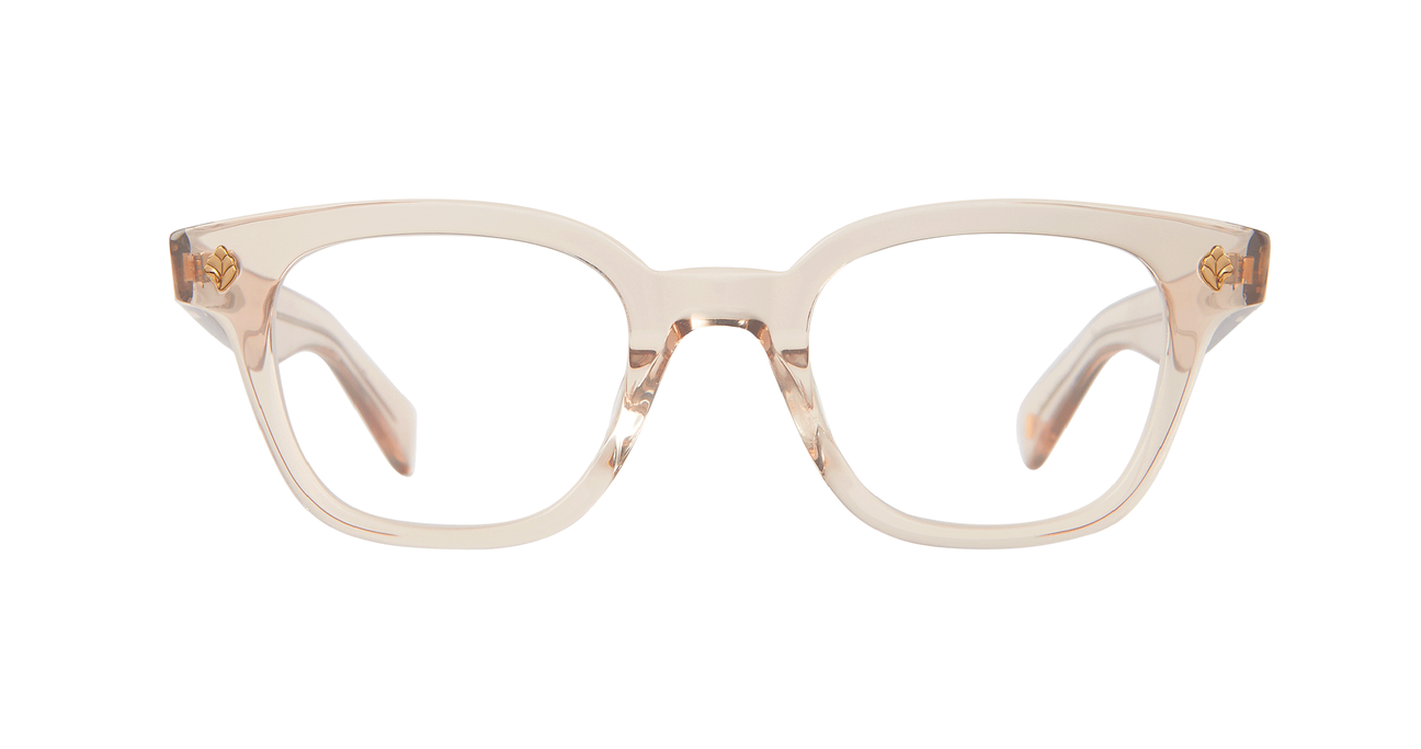 With rich materials and a bold silhouette, the Naples Bio Beige eyeglass frame infuses a modern design with vintage sensibility. Palm leaf plaques embellish the exaggerated end pieces for a look that's equal parts minimal and striking. Select colorways are crafted from our new bio-based acetate. Hand Finished in LA. Now Available in Toronto, Canada.