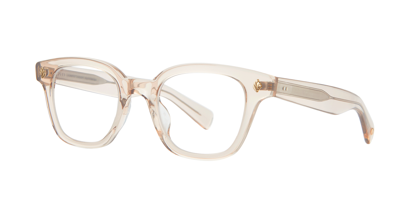 With rich materials and a bold silhouette, the Naples Bio Beige eyeglass frame infuses a modern design with vintage sensibility. Palm leaf plaques embellish the exaggerated end pieces for a look that's equal parts minimal and striking. Select colorways are crafted from our new bio-based acetate. Hand Finished in LA. Now Available in Toronto, Canada.
